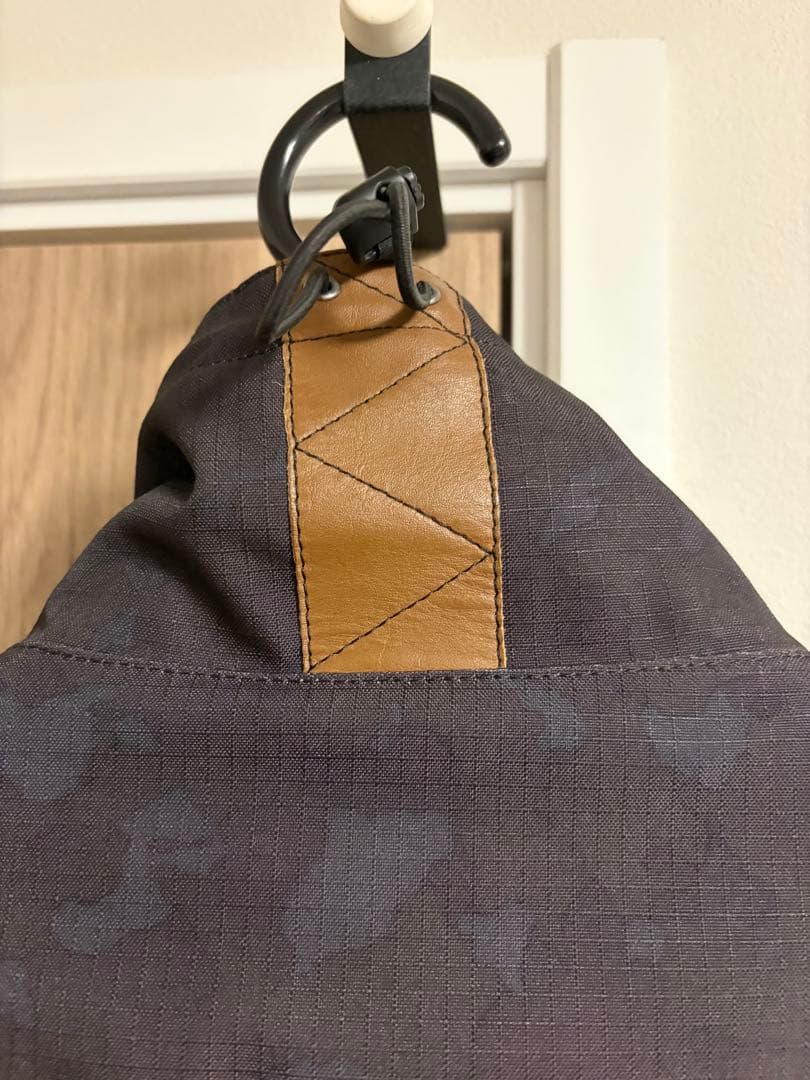 クシタニ フィンジャケット ブラックカモフラ/L