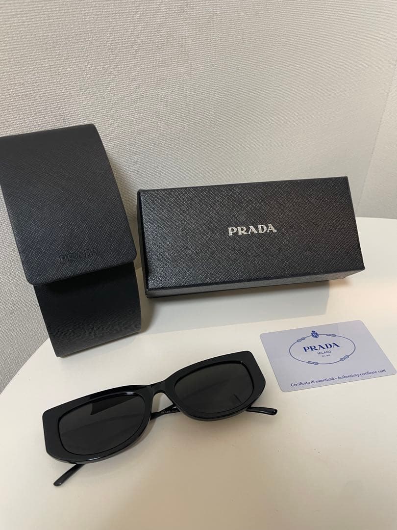 PRADA SPR14Y サングラス 三角ロゴ