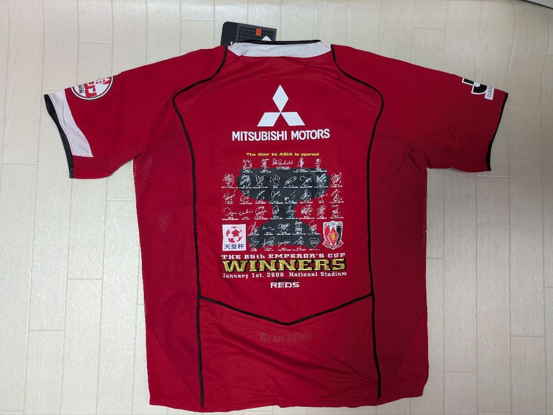 Nike 浦和レッズ　赤 サッカーシャツ Lサイズ