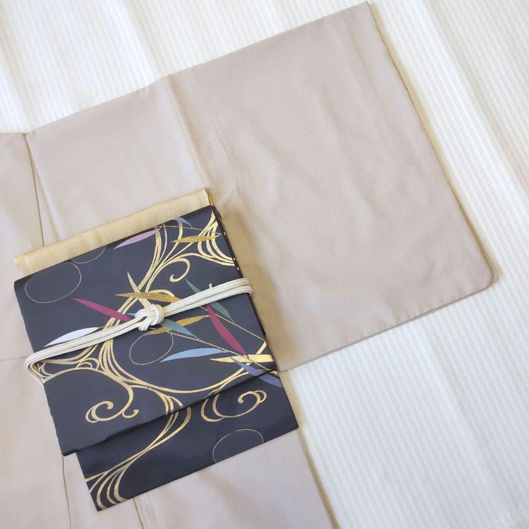 【名古屋帯】未使用品✣クールに流れる金の曲線｜チャコールグレー 流水 358cm