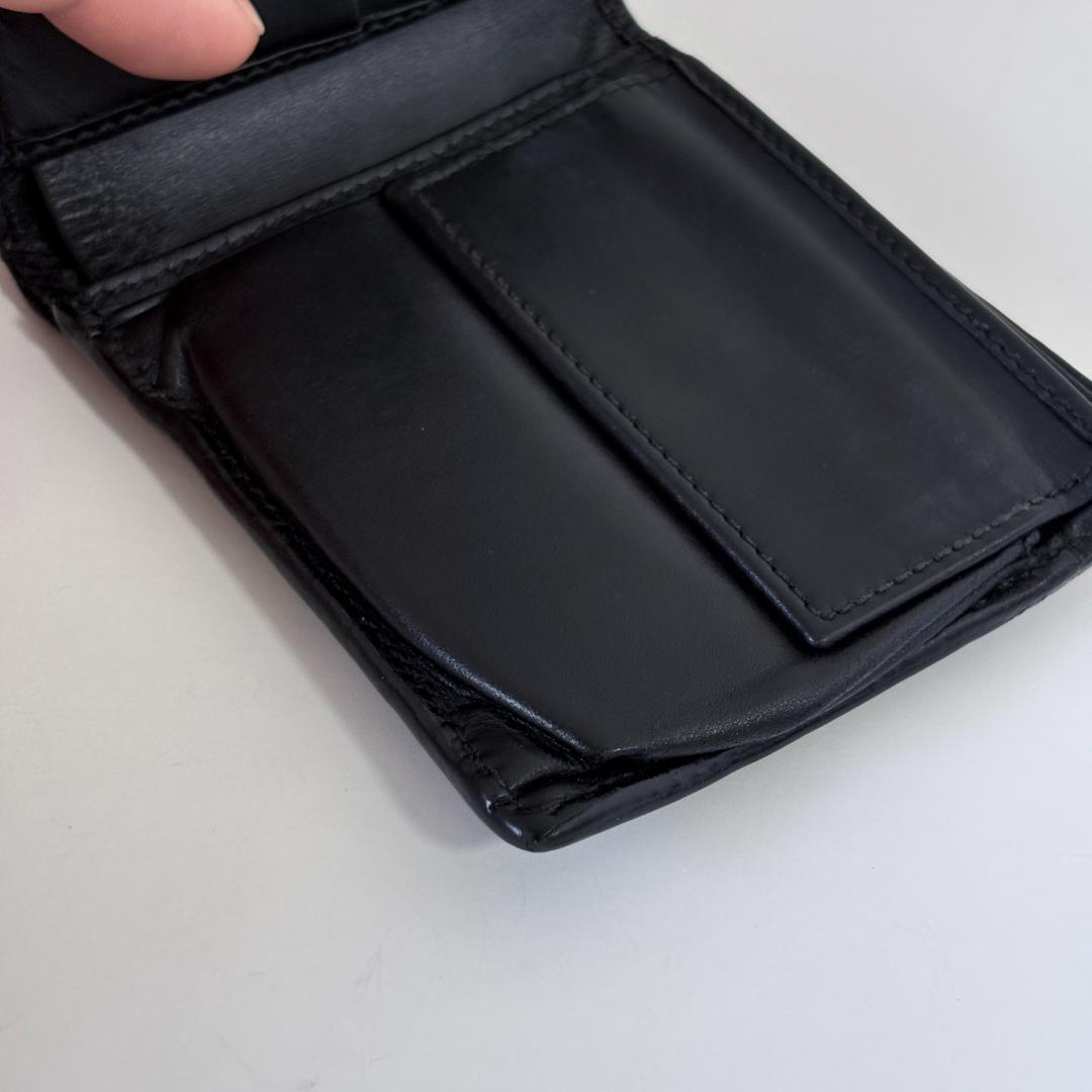 GUCCIのブラックレザー二つ折り財布、GGパターンデザイン