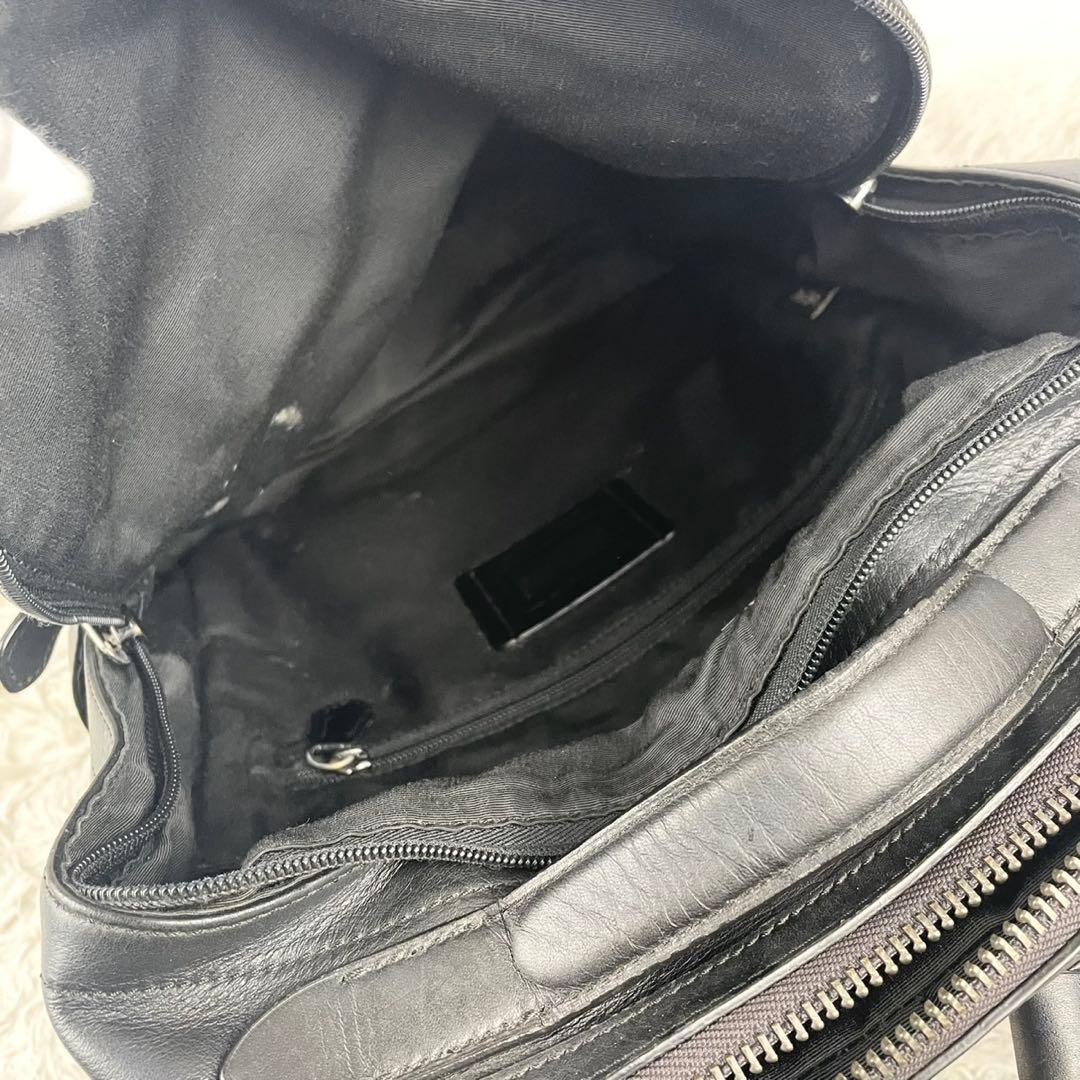 A4可 美品 コーチ PVC リュック シグネチャー ロゴ型押し ファスナー 黒
