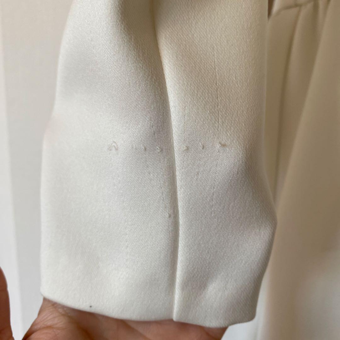 ツルバイマリコオイカワ　パール付きペプラムトップス