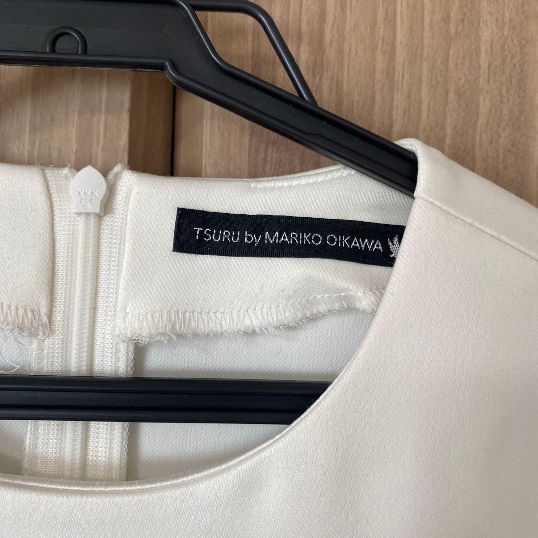 ツルバイマリコオイカワ　パール付きペプラムトップス