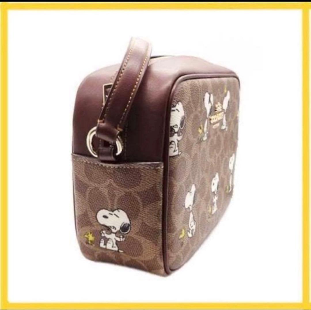 たおたろー　コーチCOACHスヌーピーコラボシグネチャー斜め掛けショルダー