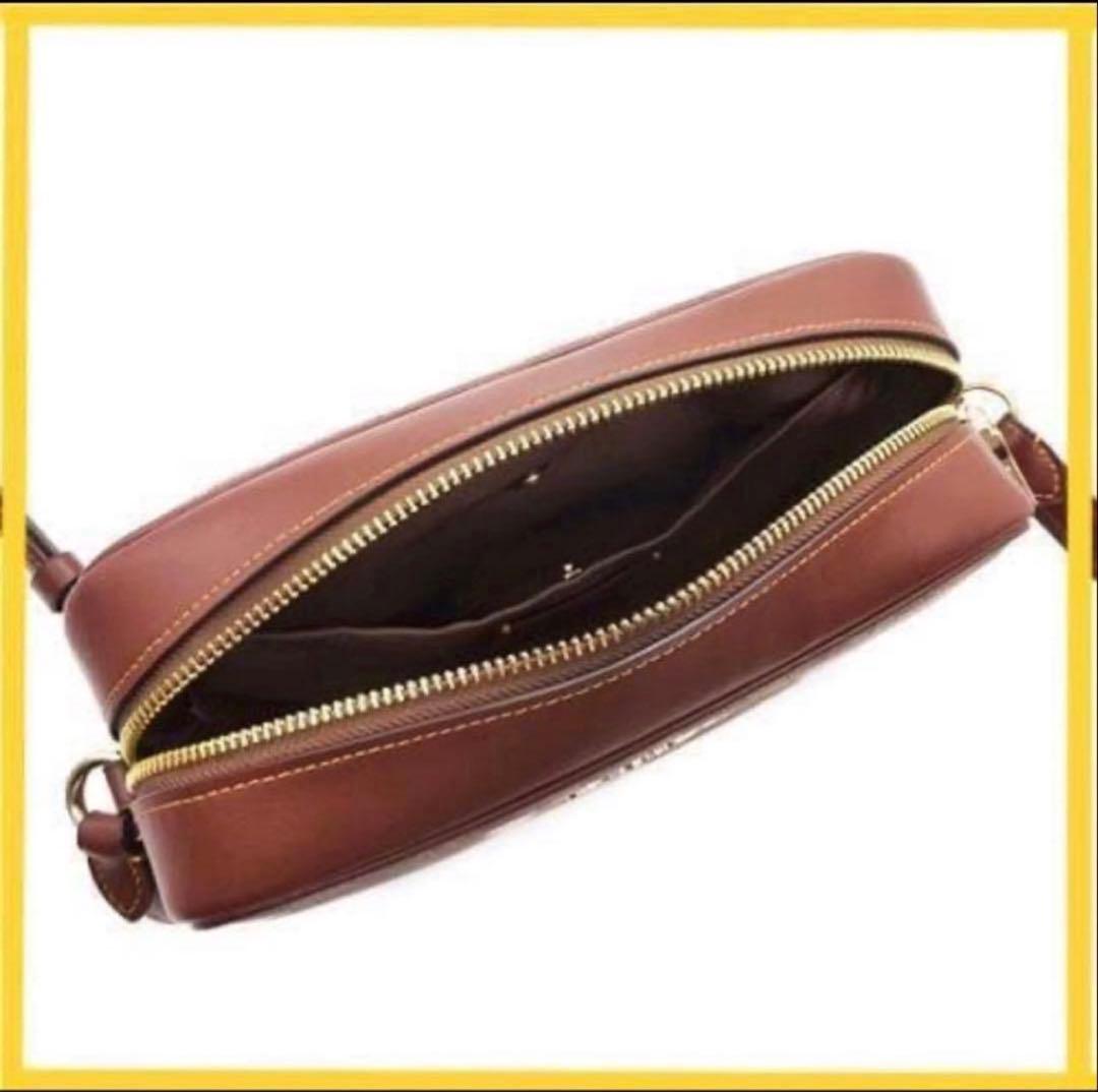 たおたろー　コーチCOACHスヌーピーコラボシグネチャー斜め掛けショルダー