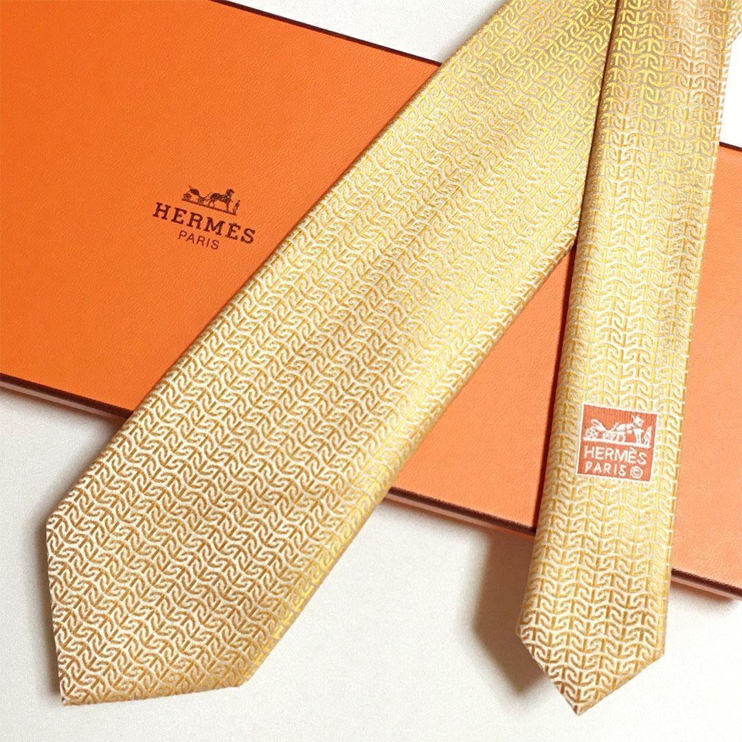 未使用級 エルメス HERMES ネクタイ シルク100% オレンジ系 総柄
