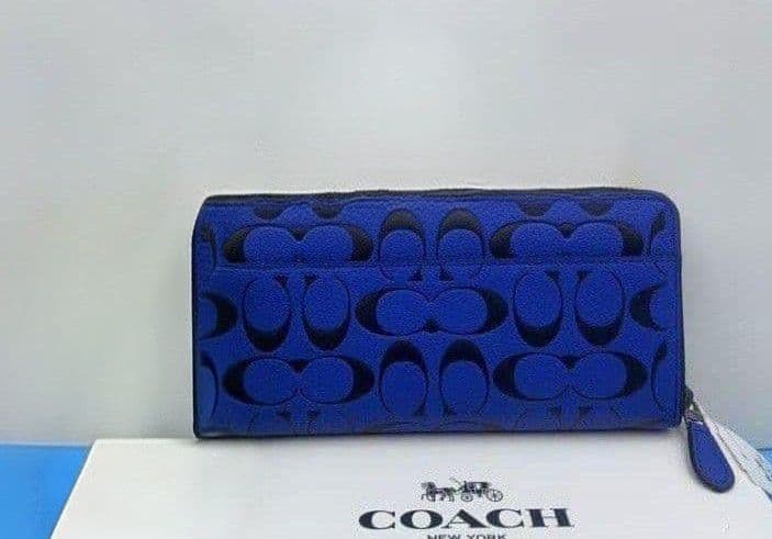 新品未使用コーチ長財布シグネチャーロングジップブルーレディースメンズ送料無料