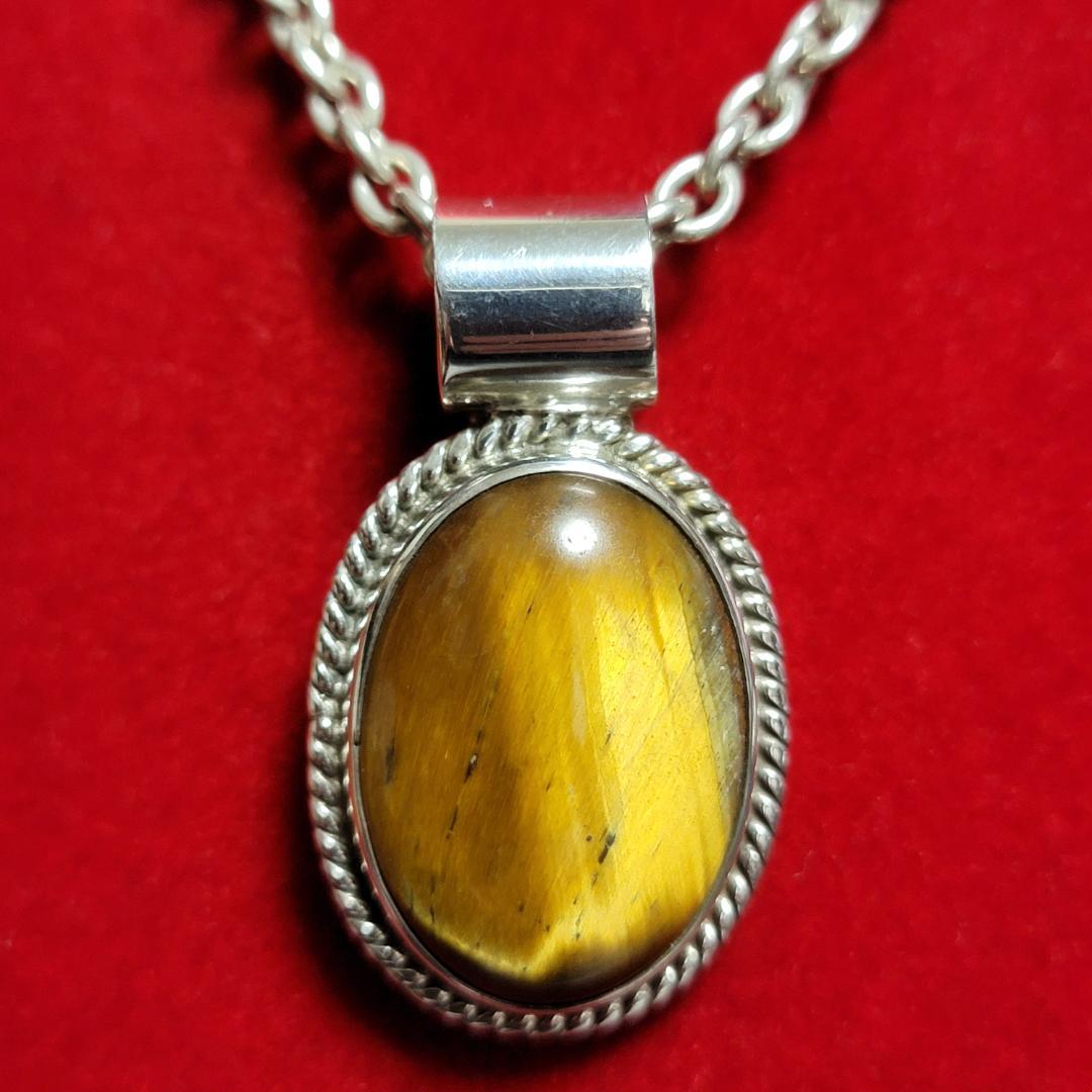 ビンテージ タイガーアイカボションと厚みのあるフレームのトップ シルバー925