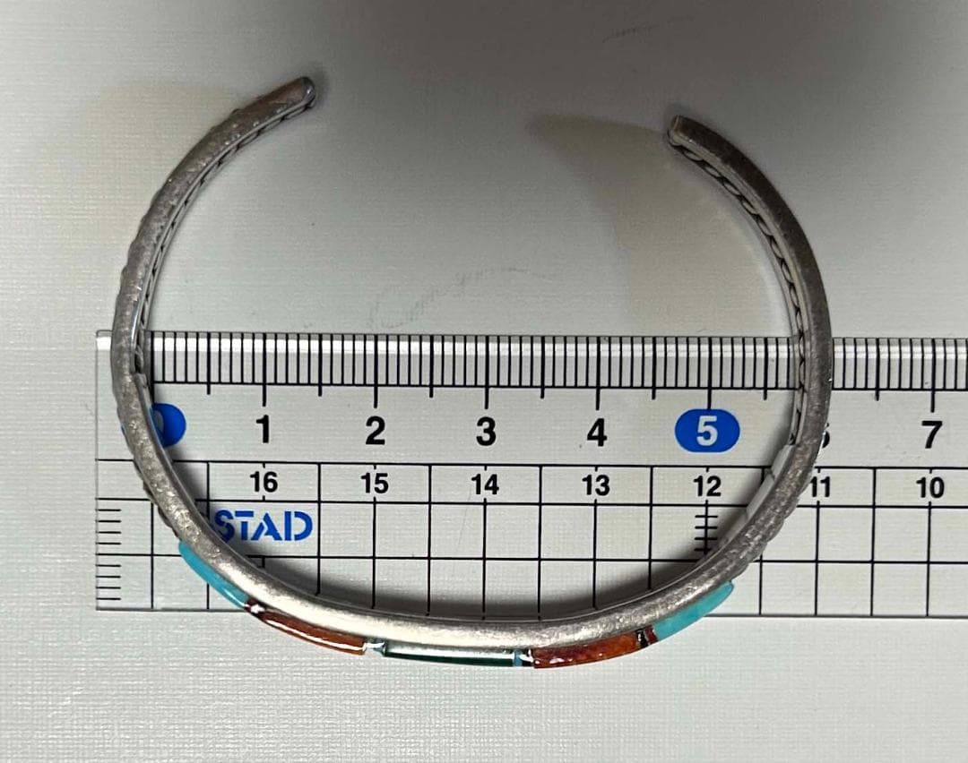 ナバホ族　ターコイズ・オレンジ他 シルバーバングル(Jダグラス )お値下げ