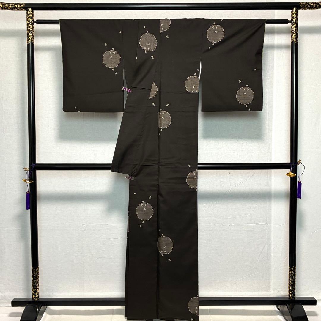 D81 本場大島紬 泥染め 雪輪 証紙付き 正絹 着物 袷 極美品