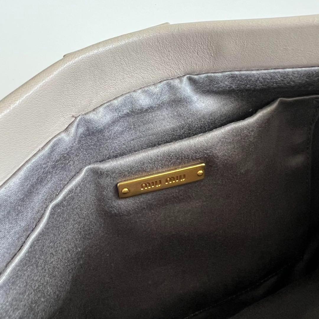 バッグ MIU MIU LEATHER STUDS FRAME CLUTCH BAG