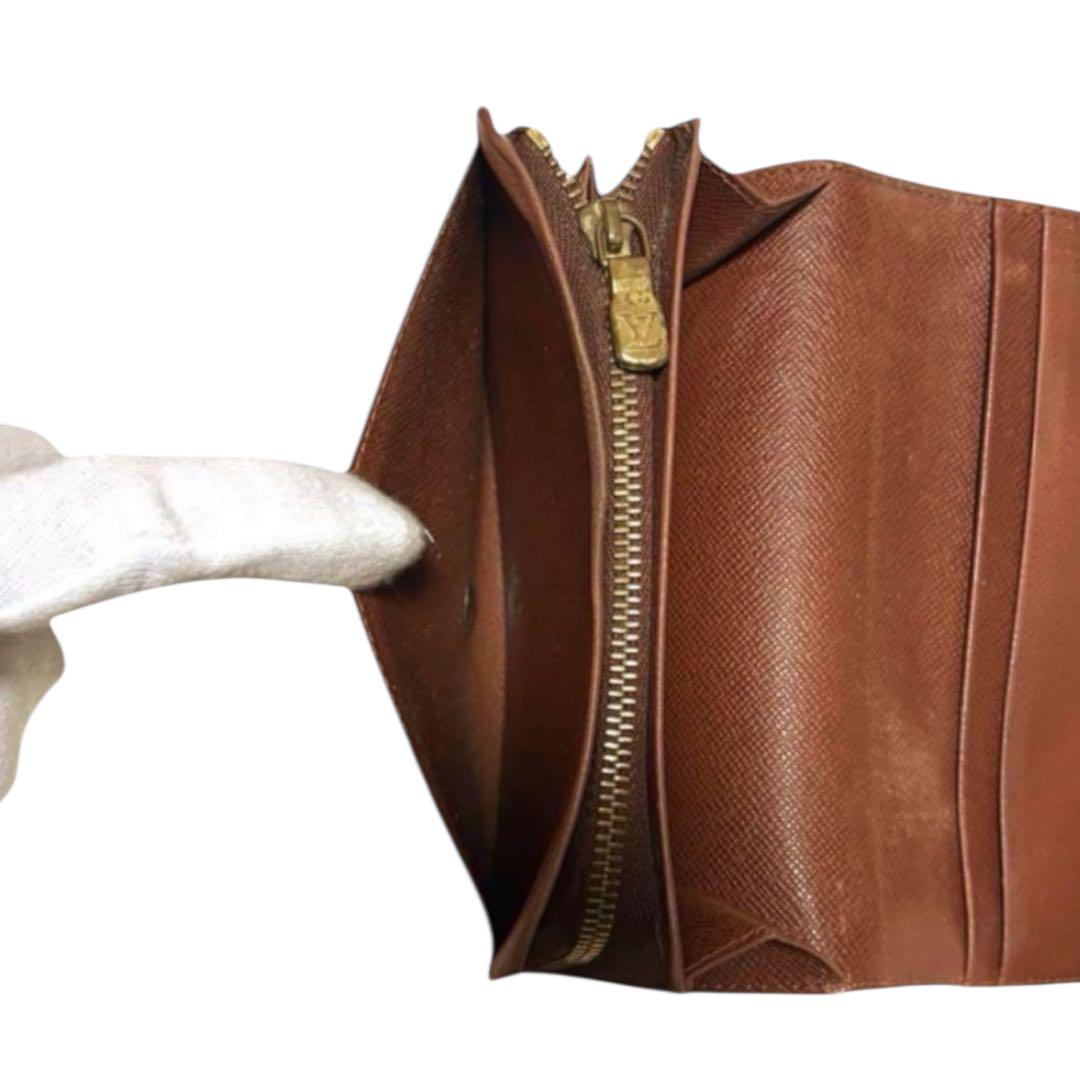 ルイヴィトン　折り財布　ポルトモネビエトレゾール　モノグラム　ブラウン　PVC