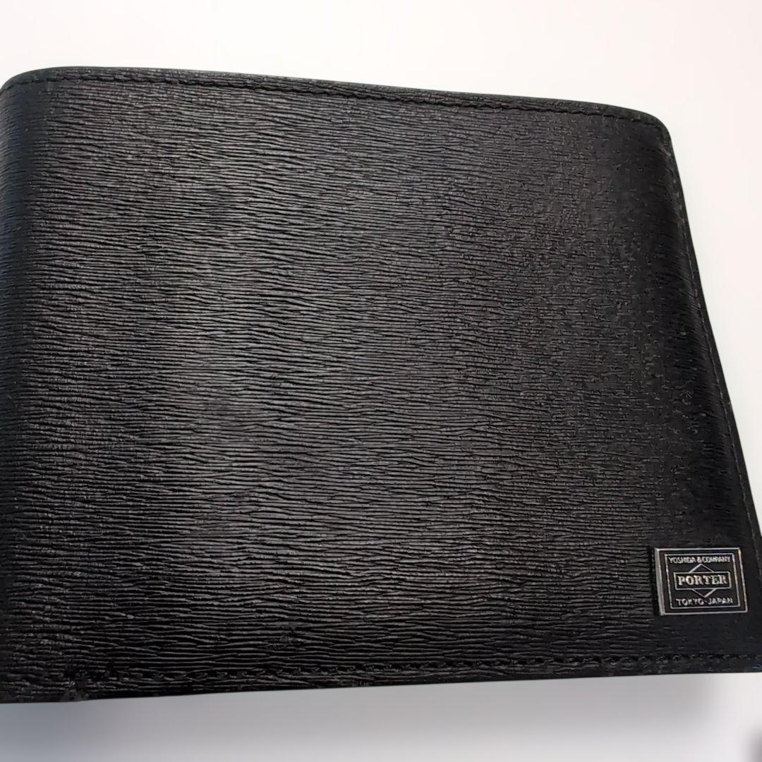 PORTER折り財布　カレント　ブラック　レザー　フラップ　ブランドロゴ金具