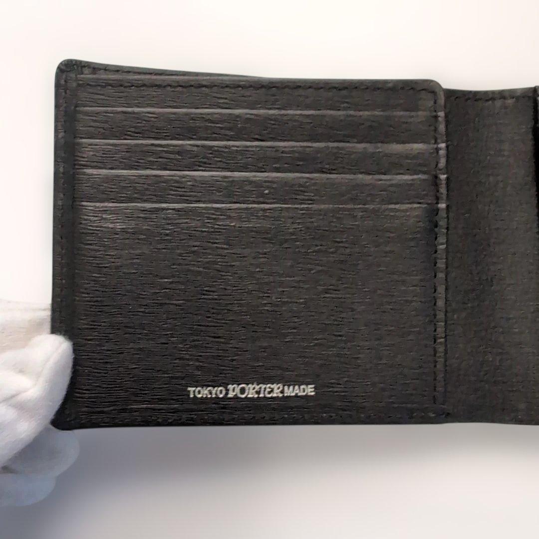 PORTER折り財布　カレント　ブラック　レザー　フラップ　ブランドロゴ金具