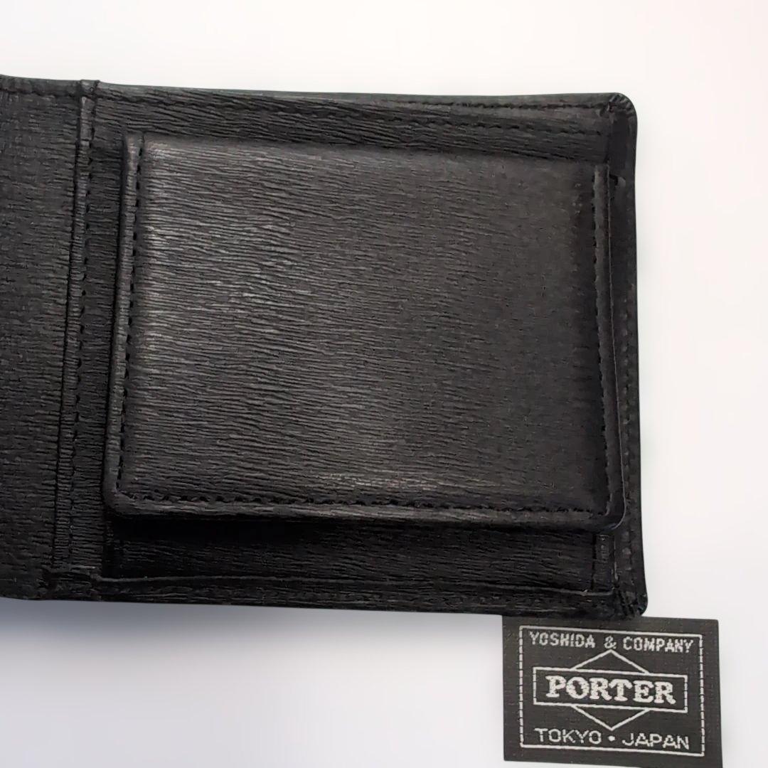 PORTER折り財布　カレント　ブラック　レザー　フラップ　ブランドロゴ金具