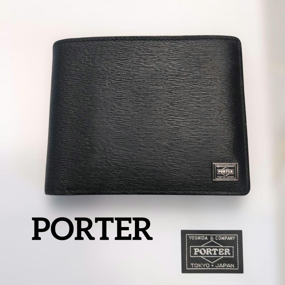 PORTER折り財布　カレント　ブラック　レザー　フラップ　ブランドロゴ金具