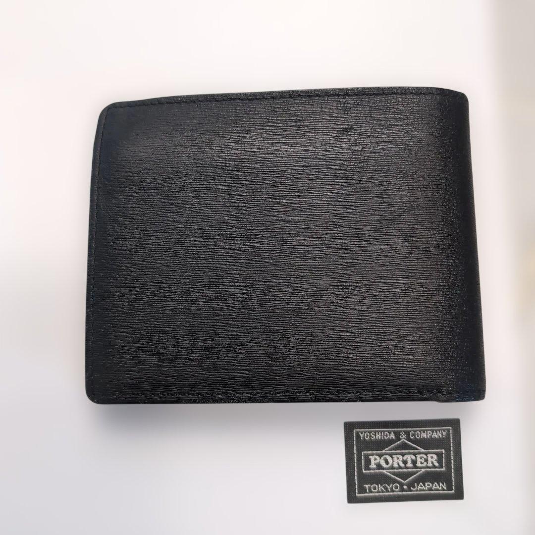 PORTER折り財布　カレント　ブラック　レザー　フラップ　ブランドロゴ金具