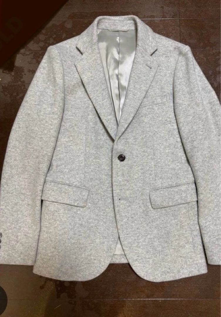 EPOCA UOMOのテーラードジャケット