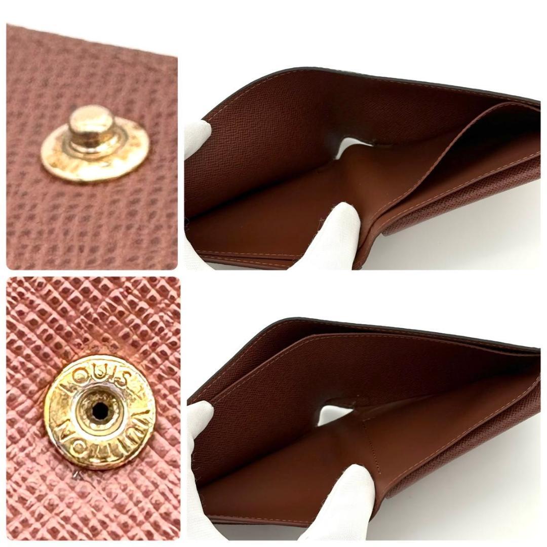 ルイヴィトン 折財布 モノグラム ポルトフォイユ マルコ NM 茶 1973