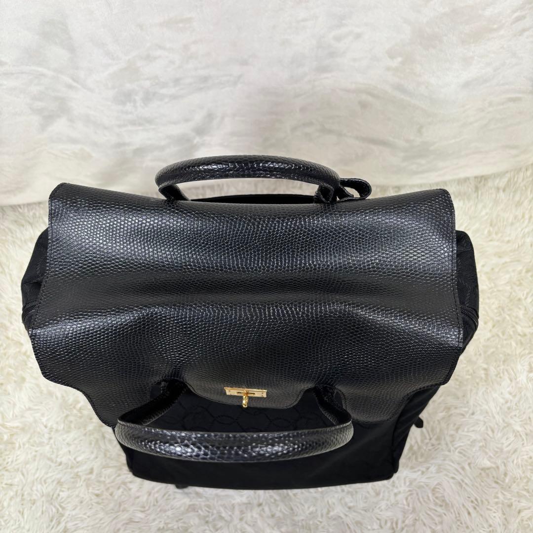 マダムヒロコ　キャリーケース　バッグ　黒　車輪