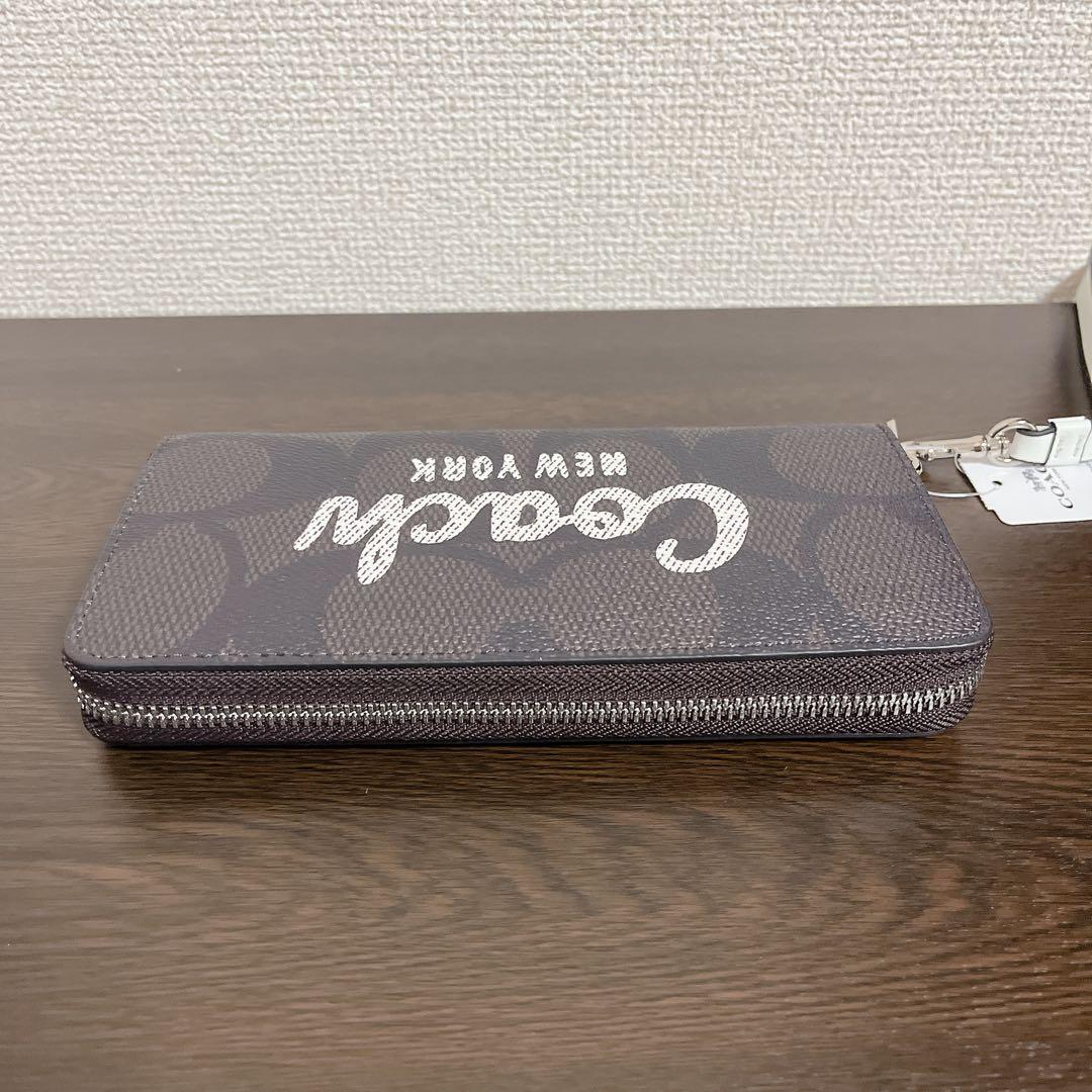 COACH 長財布　ブラウン　ストラップ付き　シグネチャー　ホワイト