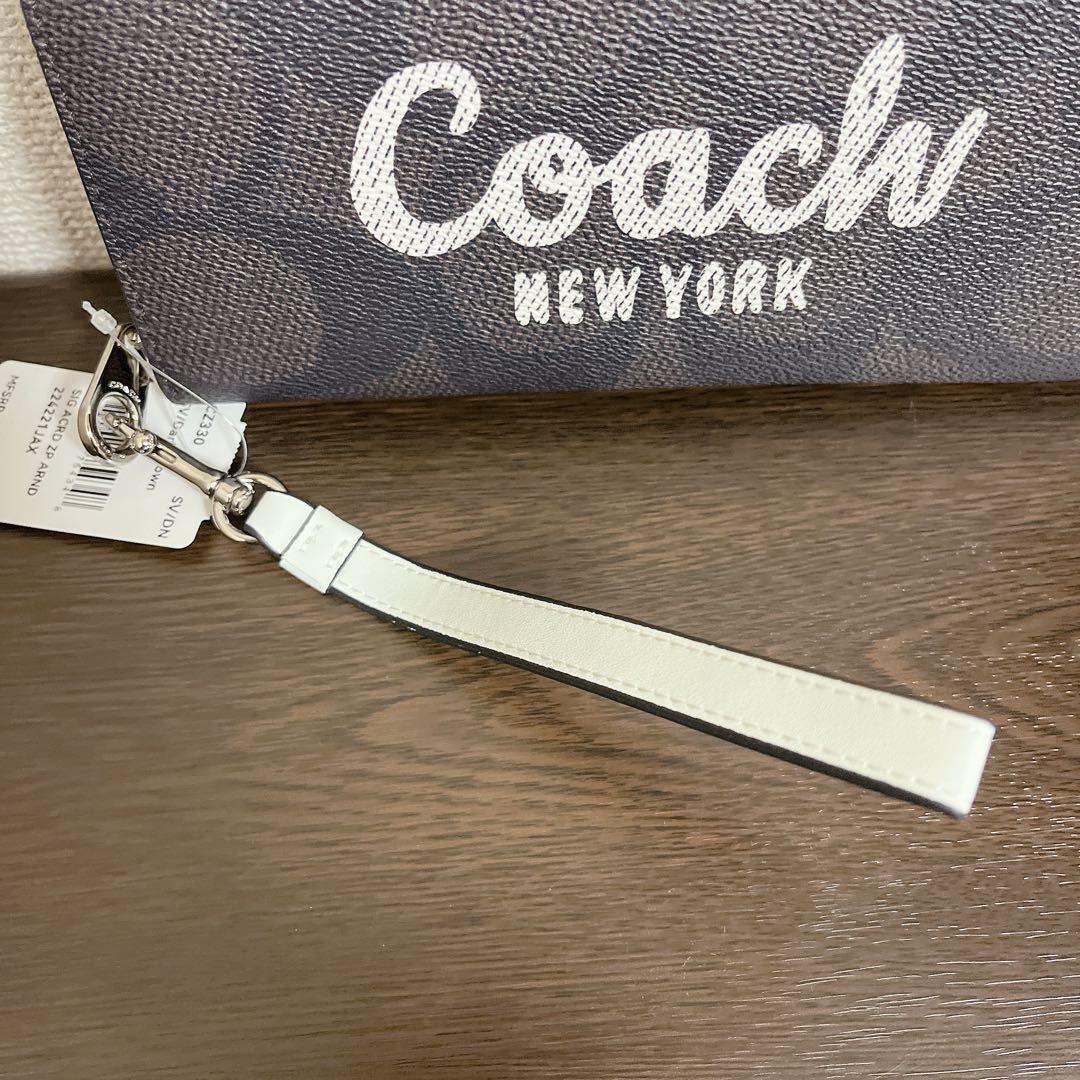 COACH 長財布　ブラウン　ストラップ付き　シグネチャー　ホワイト