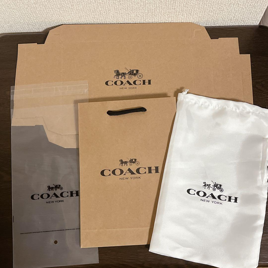 COACH 長財布　ブラウン　ストラップ付き　シグネチャー　ホワイト