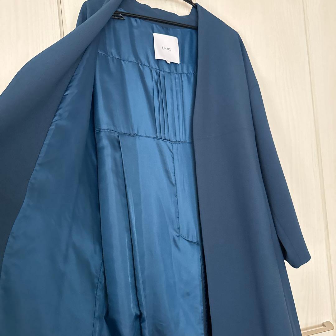 UN3D. アンスリード BACK PLEATS ノーカラーコート ターコイズ