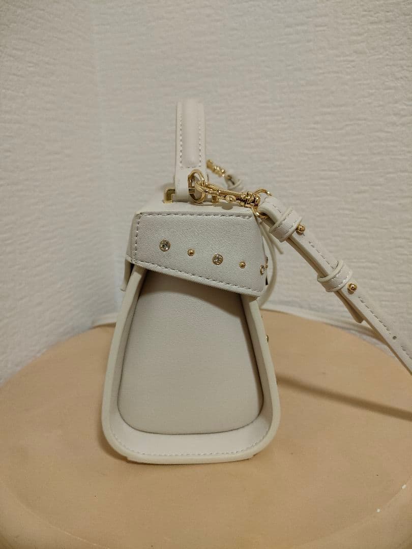 セルフォード　リュタンビジュースタッズポシェット　アイボリー