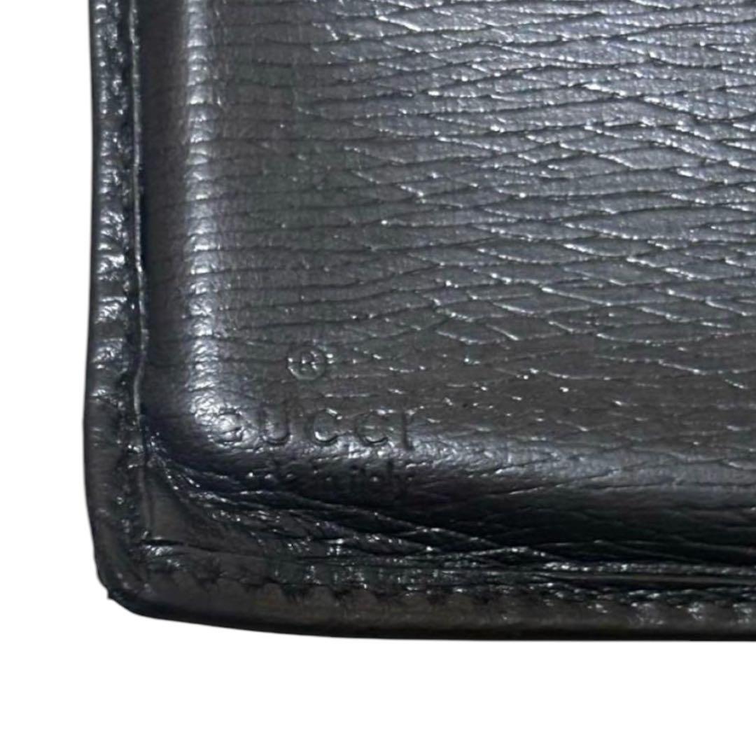 グッチ　折り財布　レザー　ブラック　金属インターロッキング　フラップ