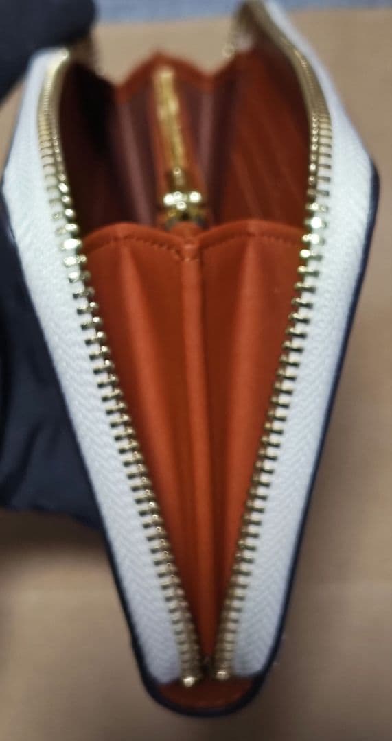 COACH 正規アウトレット品 レディース長財布 ホワイト/クリーム 蝶々柄