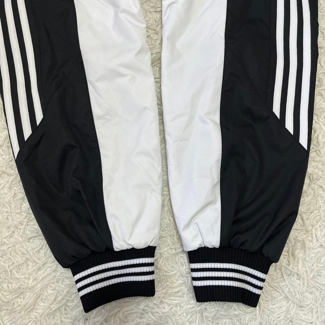 新品タグ付✨アディダスXL ウィンドストッパー スタジャン 中綿ブルゾン　黒　白