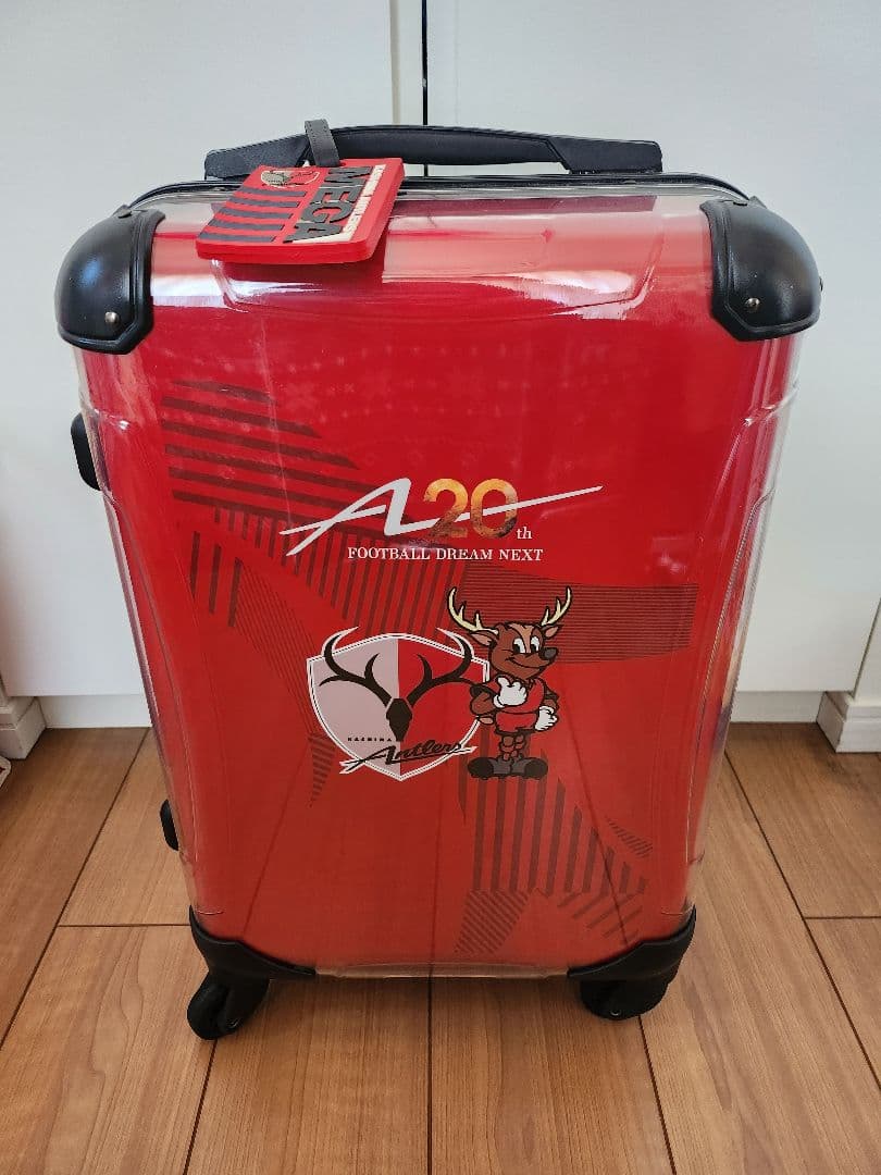 鹿島アントラーズ 赤いスーツケース