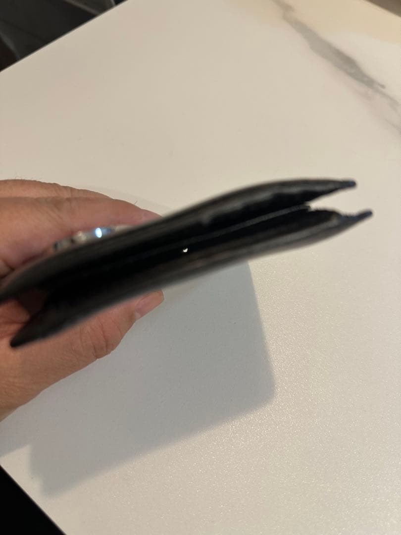 dieselブラックレザー二つ折り財布 ロゴ付き