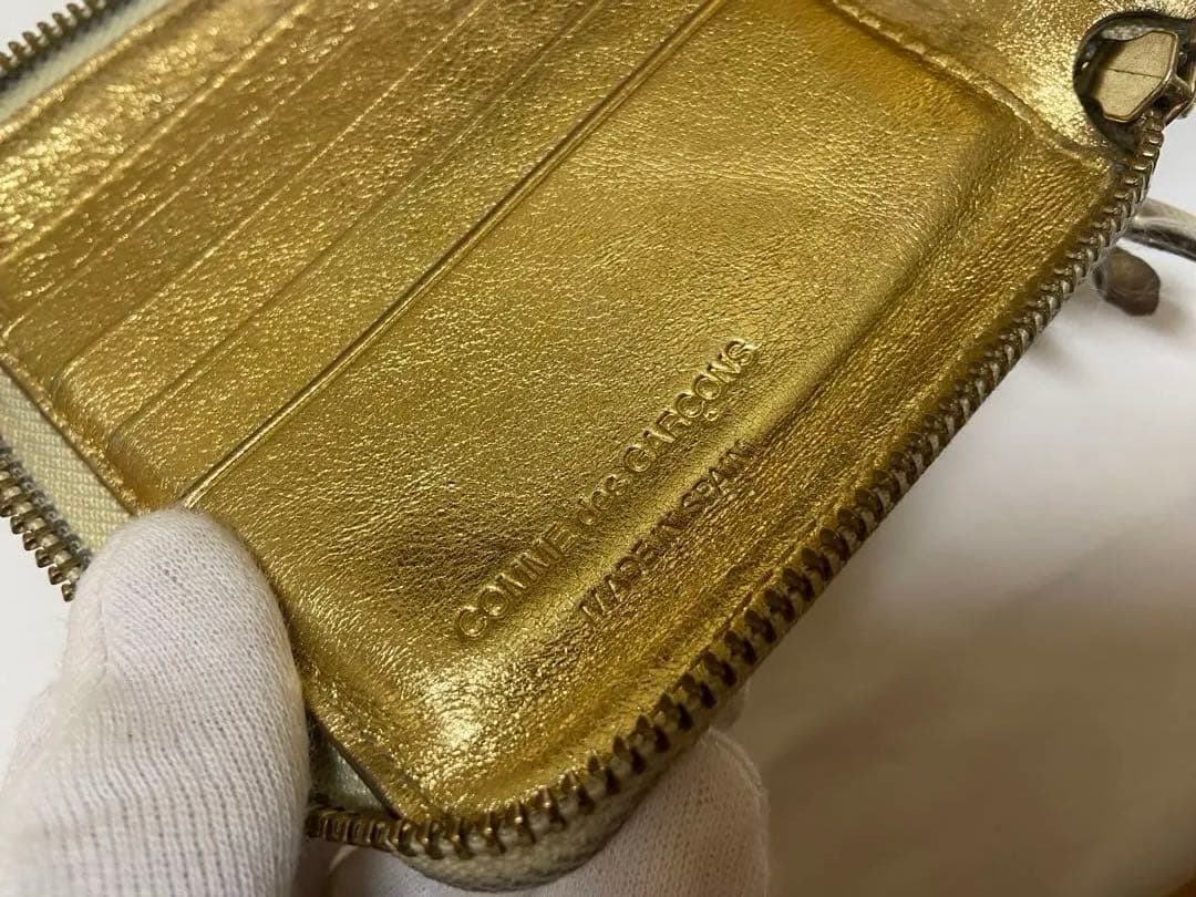 COMME des GARÇONS ゴールド二つ折り財布