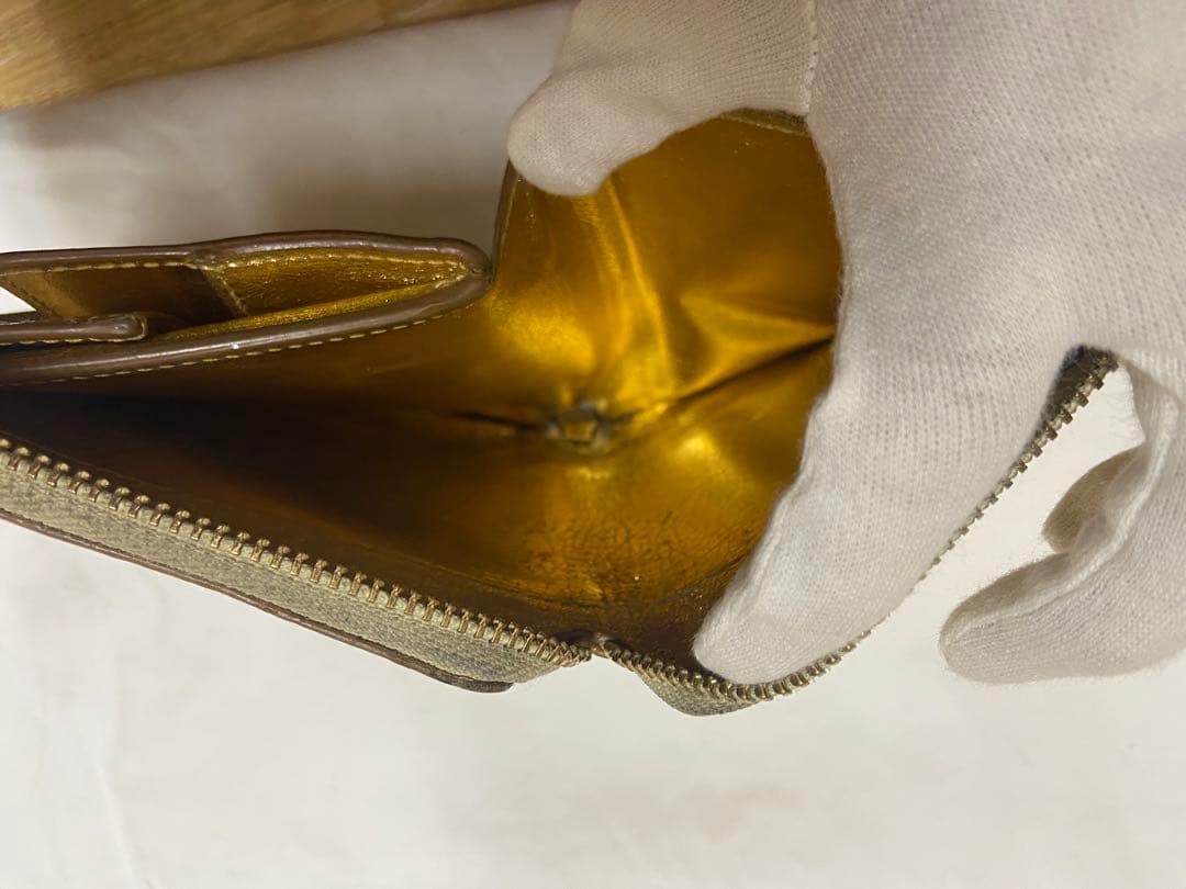 COMME des GARÇONS ゴールド二つ折り財布