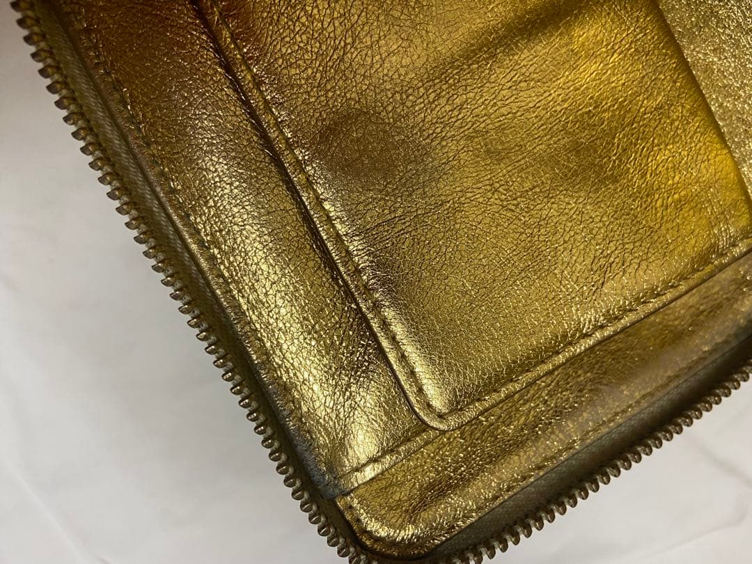 COMME des GARÇONS ゴールド二つ折り財布