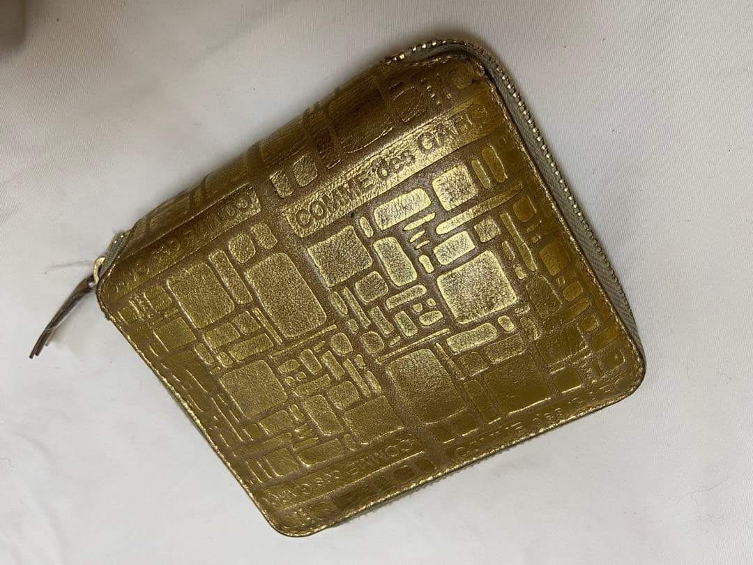 COMME des GARÇONS ゴールド二つ折り財布