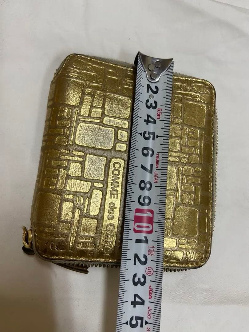 COMME des GARÇONS ゴールド二つ折り財布