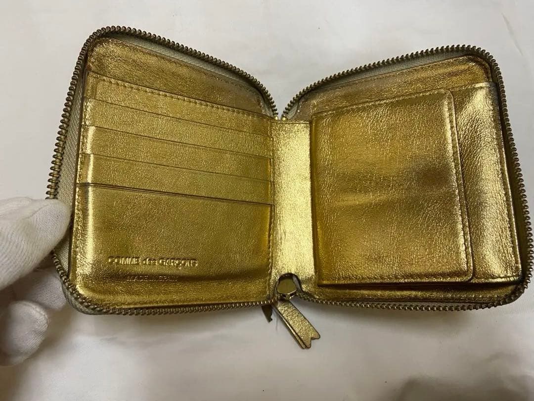 COMME des GARÇONS ゴールド二つ折り財布