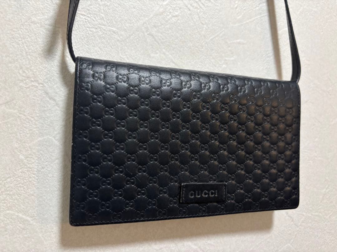 GUCCI ブラック レザー ウォレットバッグ（男女共用）