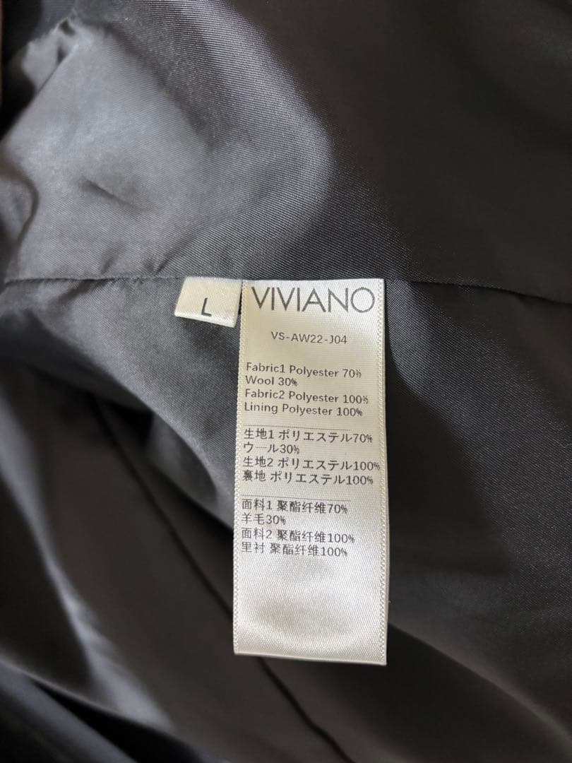 VIVANO フリル付きブラックテーラードジャケット