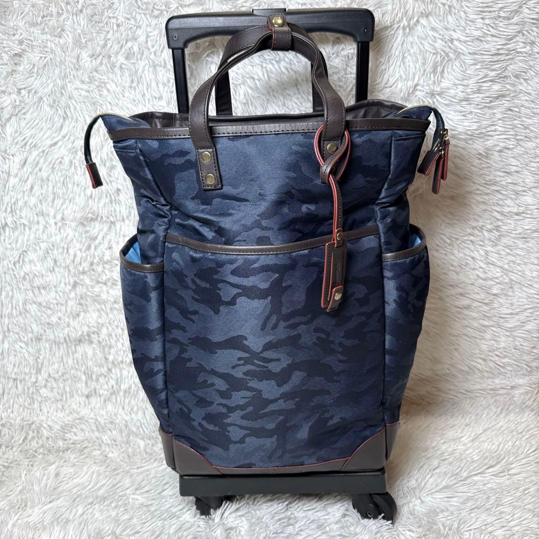 美品✨スワニー　迷彩柄　キャリーケース　車輪ストッパー付 トートバッグ 四輪