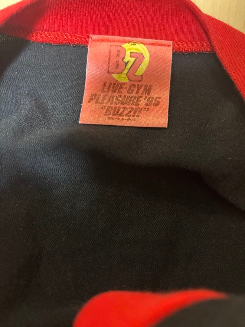B'z ラグランTシャツ \"BUZZ!\" PLEASURE 95