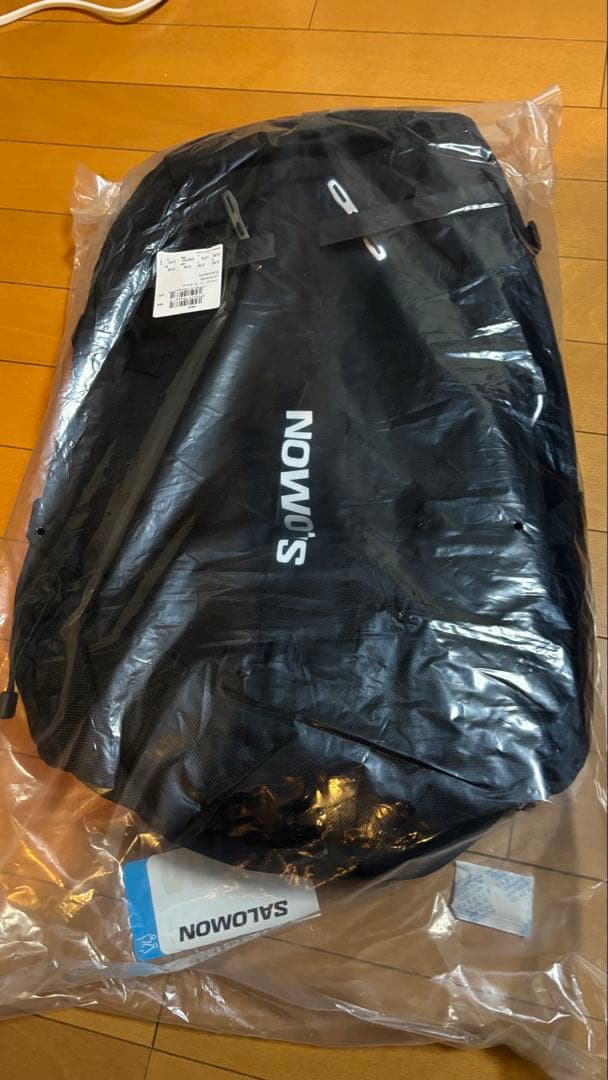 新品SALOMON LC1914700 ナップザック S/M ブラック/ホワイト