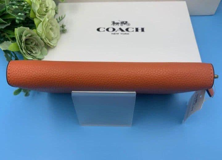 新品未使用コーチ長財布オレンジロングジップレディースメンズ送料無料即日発送
