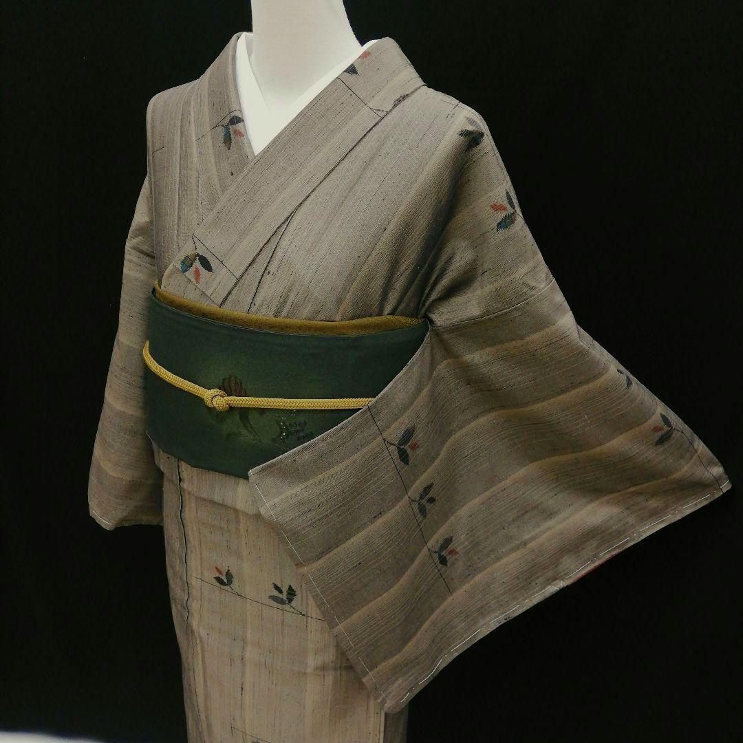 紬(袷)　(織出し枝葉紋様　縦節紬　未使用)