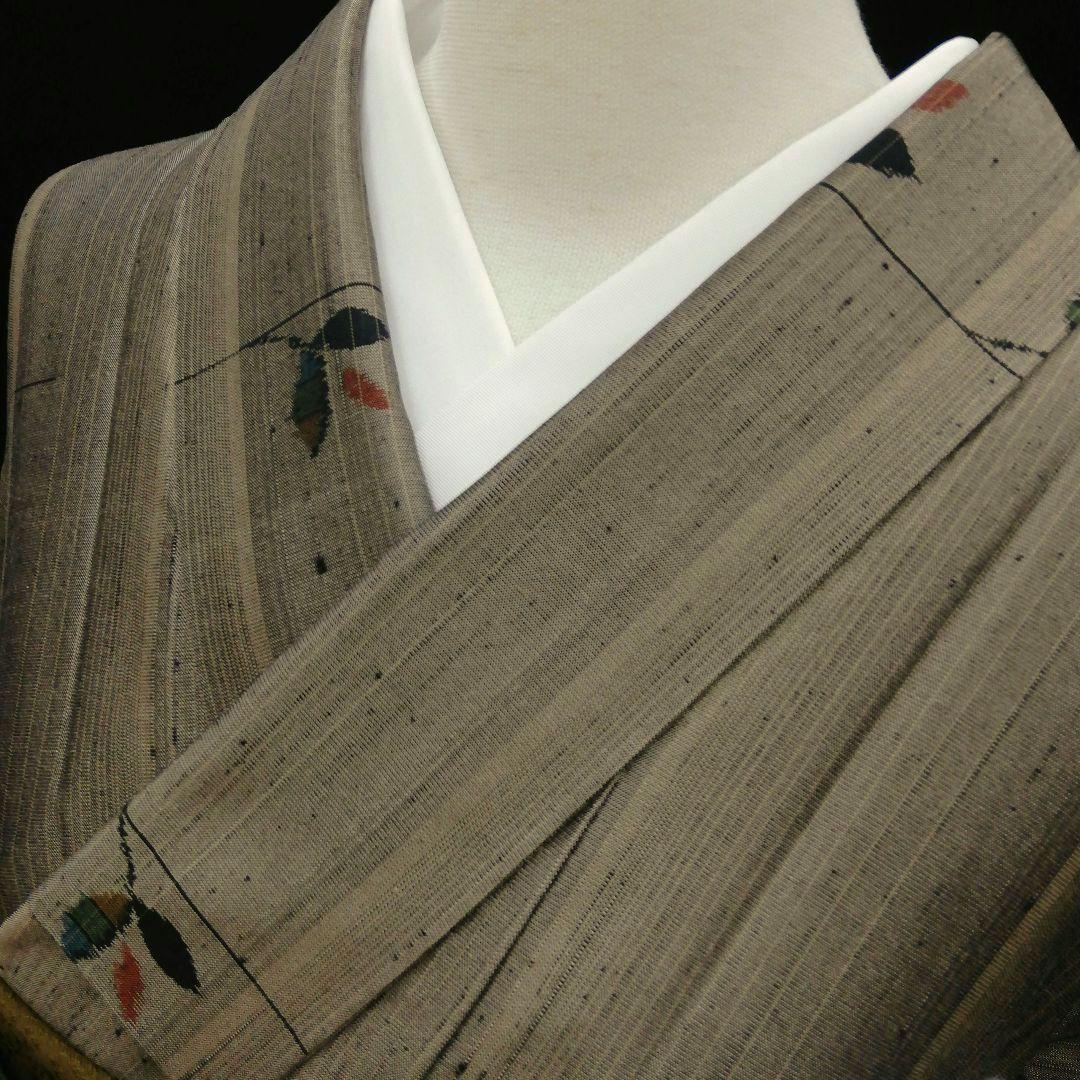 紬(袷)　(織出し枝葉紋様　縦節紬　未使用)