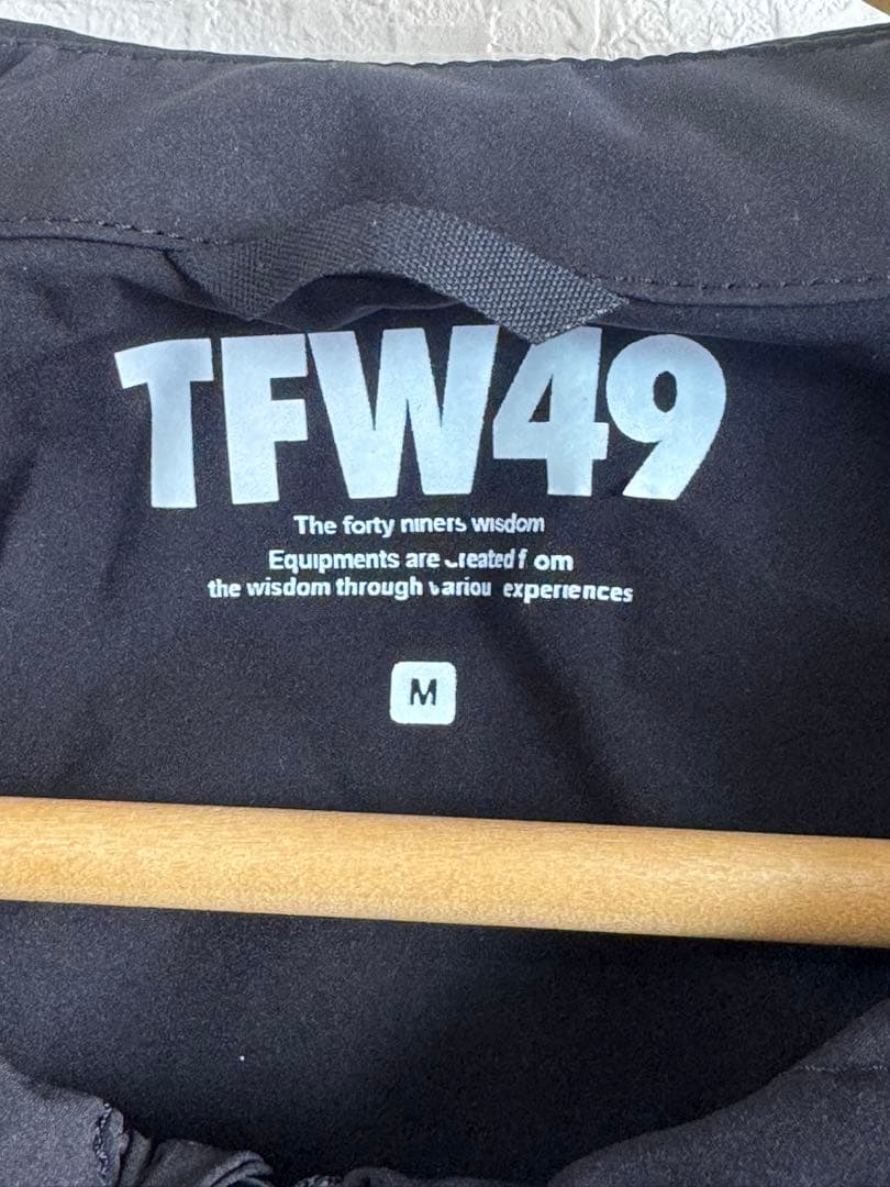 メンズウェア TFW49 SHIELD WARMER COLLARLESS VEST M